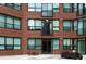 Brick building with multiple windows and balconies at 115 W Peachtree Nw Pl # 301, Atlanta, GA 30313