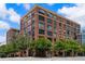 Brick building with multiple windows and balconies at 115 W Peachtree Nw Pl # 301, Atlanta, GA 30313