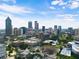 Aerial view of the city skyline with buildings and parks at 115 W Peachtree Nw Pl # 301, Atlanta, GA 30313