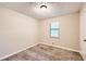 Spacious bedroom with neutral walls and carpet at 34 Powder Brook Ct, Dallas, GA 30157