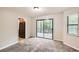 Dining area with access to kitchen and sliding glass doors to deck at 34 Powder Brook Ct, Dallas, GA 30157