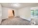 Open living area with access to deck and stairs at 34 Powder Brook Ct, Dallas, GA 30157