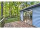 Deck overlooking wooded area, offering a peaceful retreat at 34 Powder Brook Ct, Dallas, GA 30157