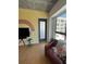 Living room with hardwood floors and city view at 563 Se Memorial Se Dr # 401, Atlanta, GA 30312