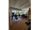 Spacious living room with hardwood floors, exposed ceiling, and city views at 563 Se Memorial Se Dr # 401, Atlanta, GA 30312