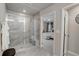 Bathroom with a large walk-in shower and view into bedroom at 5174 Longview Run, Decatur, GA 30035