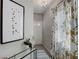Light and airy entryway with patterned curtains and console table at 5174 Longview Run, Decatur, GA 30035