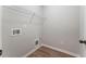 Convenient laundry room with built-in shelving at 1408 Creel Ln, Atlanta, GA 30349