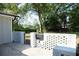 Small patio with brick wall and gate, perfect for grilling at 2790 Miriam Ln, Decatur, GA 30032