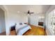 Bright bedroom with hardwood floors and an ensuite bathroom at 2790 Miriam Ln, Decatur, GA 30032