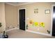 bedroom with wall decor and a door at 9931 Mancunian Way, Douglasville, GA 30135