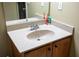 Bathroom with single vanity sink and beige countertop at 9931 Mancunian Way, Douglasville, GA 30135
