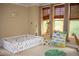 bedroom with toddler bed, playful decor, and ample natural light at 9931 Mancunian Way, Douglasville, GA 30135