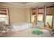 bedroom with a toddler bed, playful decor, and ample natural light at 9931 Mancunian Way, Douglasville, GA 30135