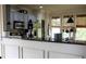 Modern kitchen with granite countertops and stainless steel appliances at 9931 Mancunian Way, Douglasville, GA 30135