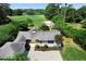 House with a large backyard backing up to a golf course at 3573 Clubhouse Ln, Conyers, GA 30094