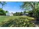 Spacious backyard with shed, patio, and open lawn at 3573 Clubhouse Ln, Conyers, GA 30094