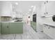 Updated kitchen with stainless steel appliances and marble-look floors at 3573 Clubhouse Ln, Conyers, GA 30094