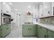 Modern kitchen featuring stainless steel appliances and green cabinets at 3573 Clubhouse Ln, Conyers, GA 30094