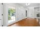 Bright and spacious entryway with hardwood floors and large windows at 3573 Clubhouse Ln, Conyers, GA 30094