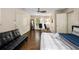 Bedroom with a workspace, queen bed, and access to closets at 1195 Vineyard Se Dr, Conyers, GA 30013