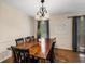 Formal dining room with hardwood floors, chandelier, and large wooden table at 1195 Vineyard Se Dr, Conyers, GA 30013