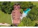 Bird's-eye view of the house, pool, and surrounding landscape at 1195 Vineyard Se Dr, Conyers, GA 30013