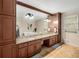 Double vanity bathroom with granite countertops, large soaking tub, and ample storage at 1195 Vineyard Se Dr, Conyers, GA 30013