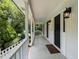 Inviting front porch with wooden railings at 1195 Vineyard Se Dr, Conyers, GA 30013