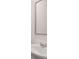 Simple bathroom with white sink and framed mirror at 1029 Cades Walk, Lawrenceville, GA 30045