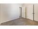 Large bedroom with carpet, neutral walls and two closets at 6635 Shapiro Ct, Stone Mountain, GA 30087
