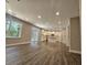 Open concept kitchen with island and stainless steel appliances at 2900 Brandford Trl, Locust Grove, GA 30248