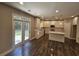 Modern kitchen with white cabinets and quartz countertops at 2900 Brandford Trl, Locust Grove, GA 30248