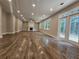 Open great room with hardwood floors and sliding glass doors at 2900 Brandford Trl, Locust Grove, GA 30248