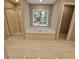 Bathroom with a large garden tub and a walk-in shower at 2900 Brandford Trl, Locust Grove, GA 30248
