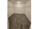 Large walk-in closet with double rods and carpeted flooring at 2900 Brandford Trl, Locust Grove, GA 30248
