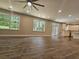 Large great room with hardwood floors and kitchen views at 2900 Brandford Trl, Locust Grove, GA 30248