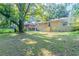 House backyard view, large tree, and grassy area at 2812 Mitchell Dr, Decatur, GA 30032