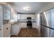 Updated kitchen with granite countertops and stainless steel appliances at 2812 Mitchell Dr, Decatur, GA 30032