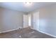 Bright bedroom featuring neutral walls and carpet at 2812 Mitchell Dr, Decatur, GA 30032