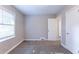 Spacious bedroom with neutral walls and carpet at 2812 Mitchell Dr, Decatur, GA 30032