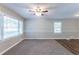 Living Room with carpet, large windows, and ceiling fan at 2812 Mitchell Dr, Decatur, GA 30032