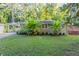 Ranch house with covered porch and lush landscaping at 2812 Mitchell Dr, Decatur, GA 30032