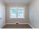 Bedroom with wood paneling and carpet flooring at 2812 Mitchell Dr, Decatur, GA 30032