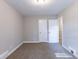 Spacious bedroom with neutral walls and carpet at 2812 Mitchell Dr, Decatur, GA 30032