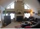 Spacious living room featuring a fireplace and vaulted ceilings at 130 Liberty Path, Dallas, GA 30157
