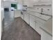 Kitchen with white cabinets, sink and appliances at 3805 Stonewall Se Ter # 3805, Atlanta, GA 30339