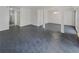 Large living room with tile floors and access to patio at 3805 Stonewall Se Ter # 3805, Atlanta, GA 30339