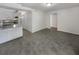 Open dining area with kitchen access and view to backyard at 3805 Stonewall Se Ter # 3805, Atlanta, GA 30339