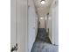 Clean entry hall with dark tile floor and built-in storage at 3805 Stonewall Se Ter # 3805, Atlanta, GA 30339